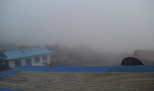 View of the pea soup from our lodge. The runway is out there somewhere. Photo credit: Kevin Cordova